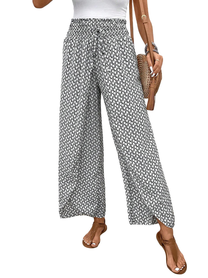 White Veda Bremen Stella wide-leg printed trousers with relaxed fit and stylish design.