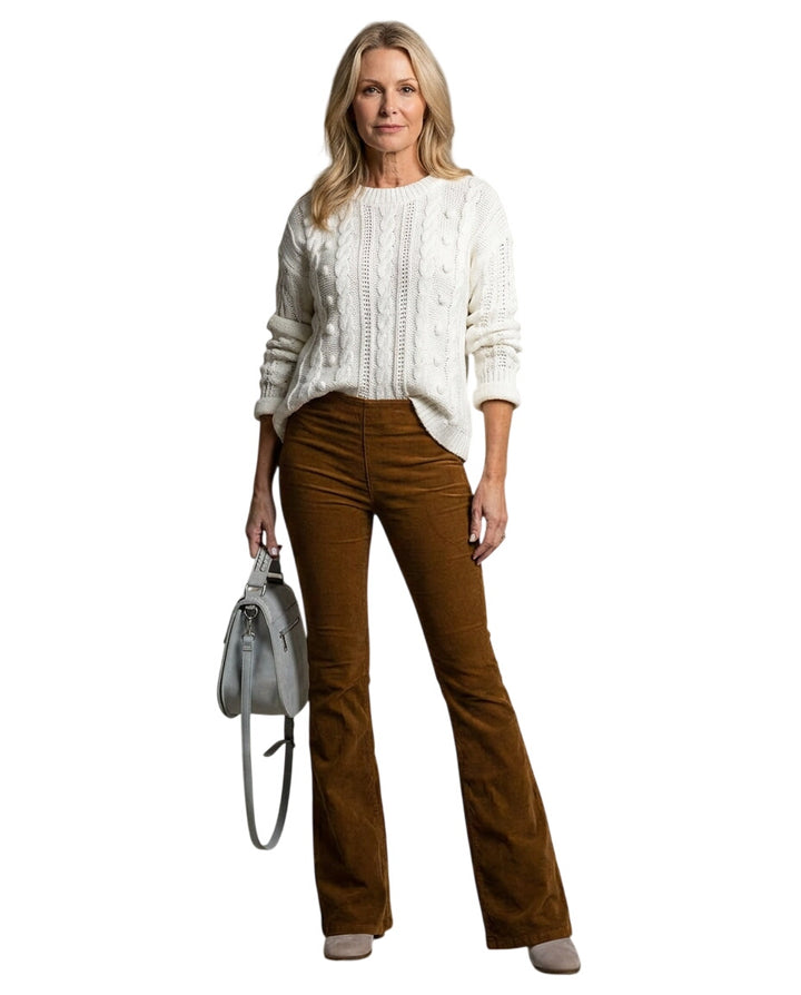 LuroLondon Chloe corduroy flared trousers displayed on a hanger with a neutral background.