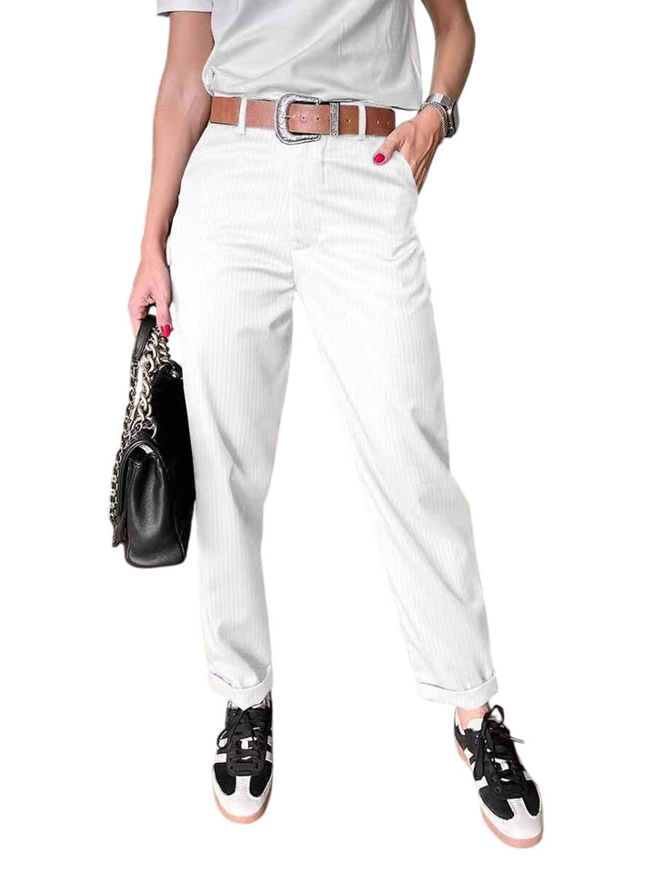 Veda Bremen Melly elegant, fitted striped pants with a sleek design, shown in black and white, highlighting the tailored fit.
