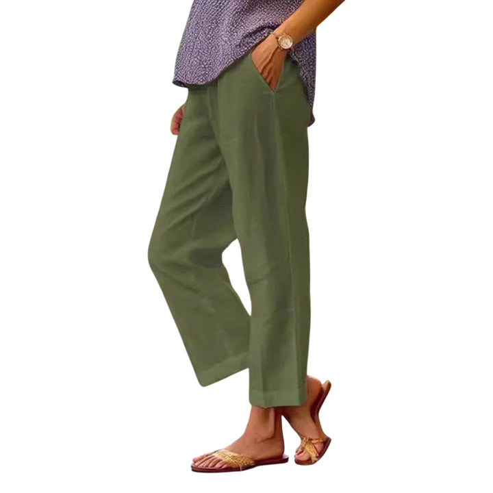 LuroLondon Lisa lightweight army green trousers with a relaxed fit and tapered legs, made from breathable fabric.