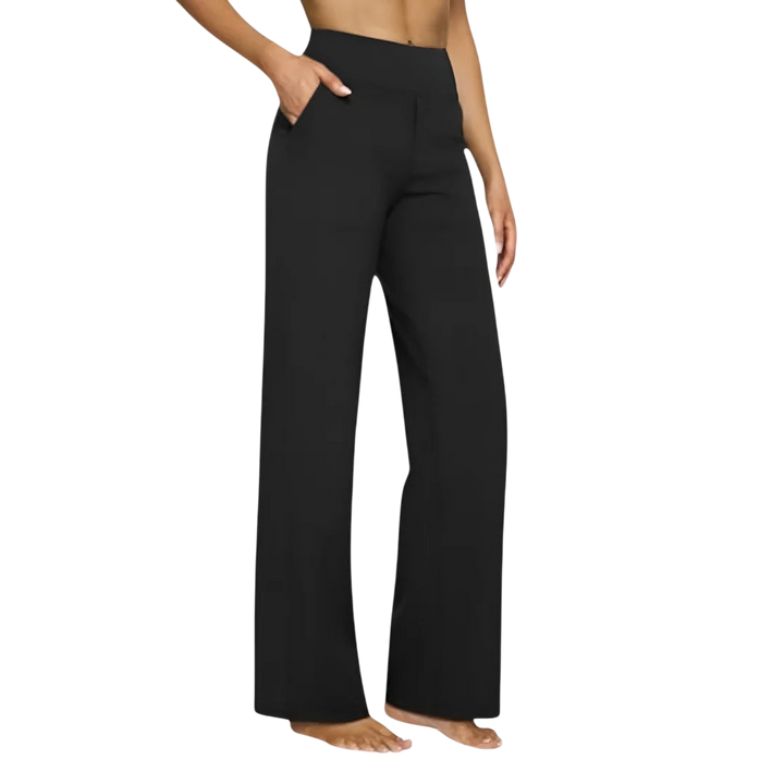 Black Kara stretch-hose by Veda Bremen, close-up of smooth fabric and elastic waistband for comfortable fit.
