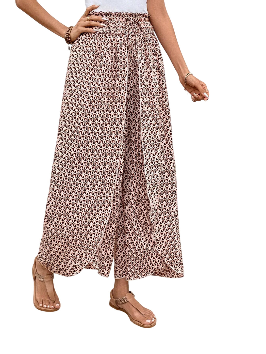 Veda Bremen Stella wide-leg printed trousers in skin color with bold pattern, relaxed fit and flowy silhouette.