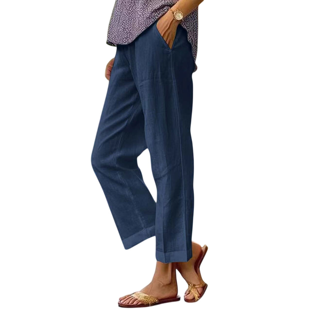 Navy blue Lisa lightweight trousers by LuroLondon displayed on a model, showcasing slim fit and casual style.