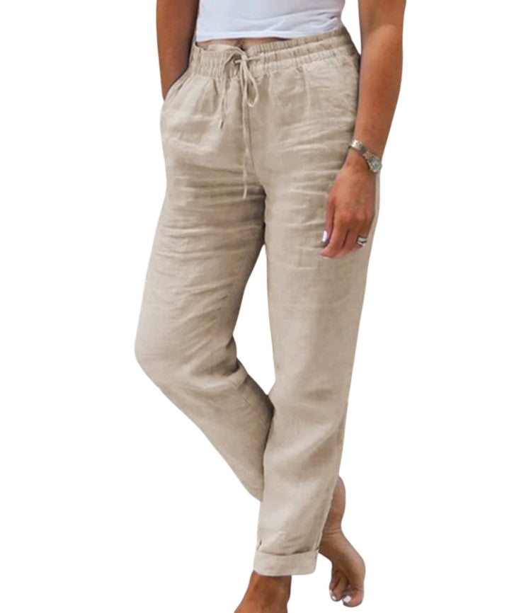 Khaki soft linen trousers by Veda Bremen, showing relaxed fit and lightweight fabric with side pockets and straight leg design.