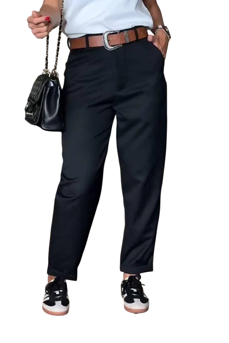 Black Veda Bremen Melly elegant, figure-hugging striped pants with a sleek design and tailored fit.