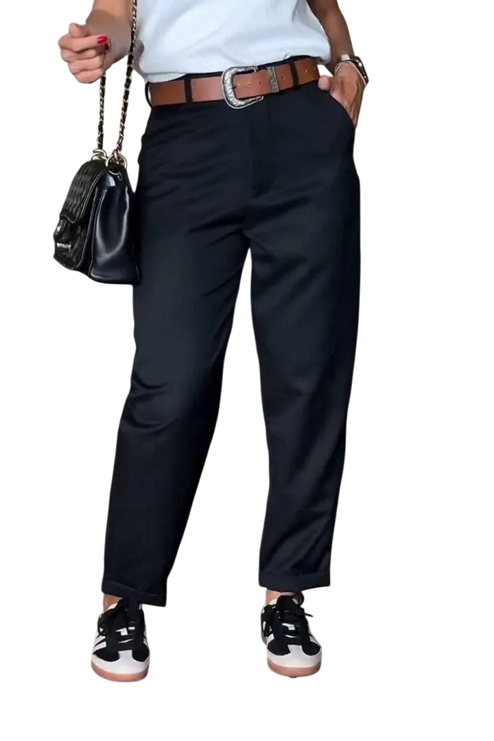 Black Veda Bremen Melly elegant, figure-hugging striped pants with a sleek design and tailored fit.
