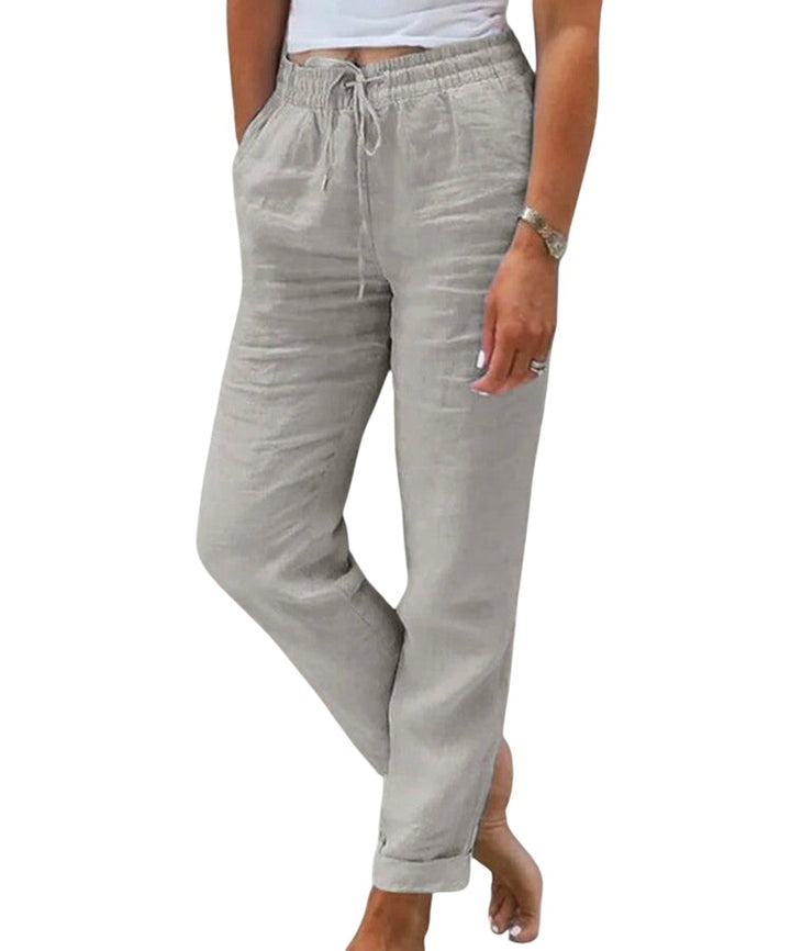 Soft Loom Leinenhose by Veda Bremen in grey, shown on model, featuring relaxed fit and lightweight linen fabric.