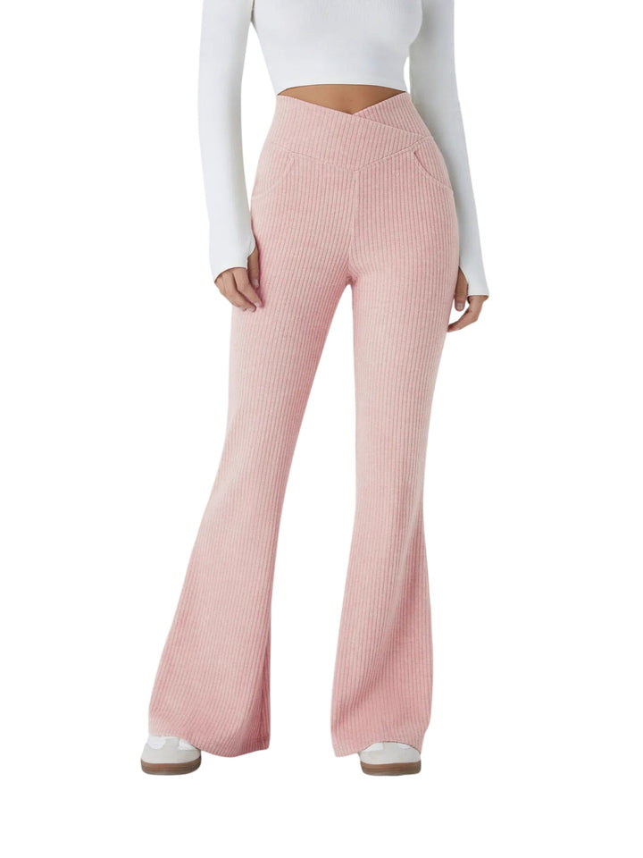 Pink high waisted flare trousers from Lurolondon.co.uk, featuring a stylish and trendy silhouette.