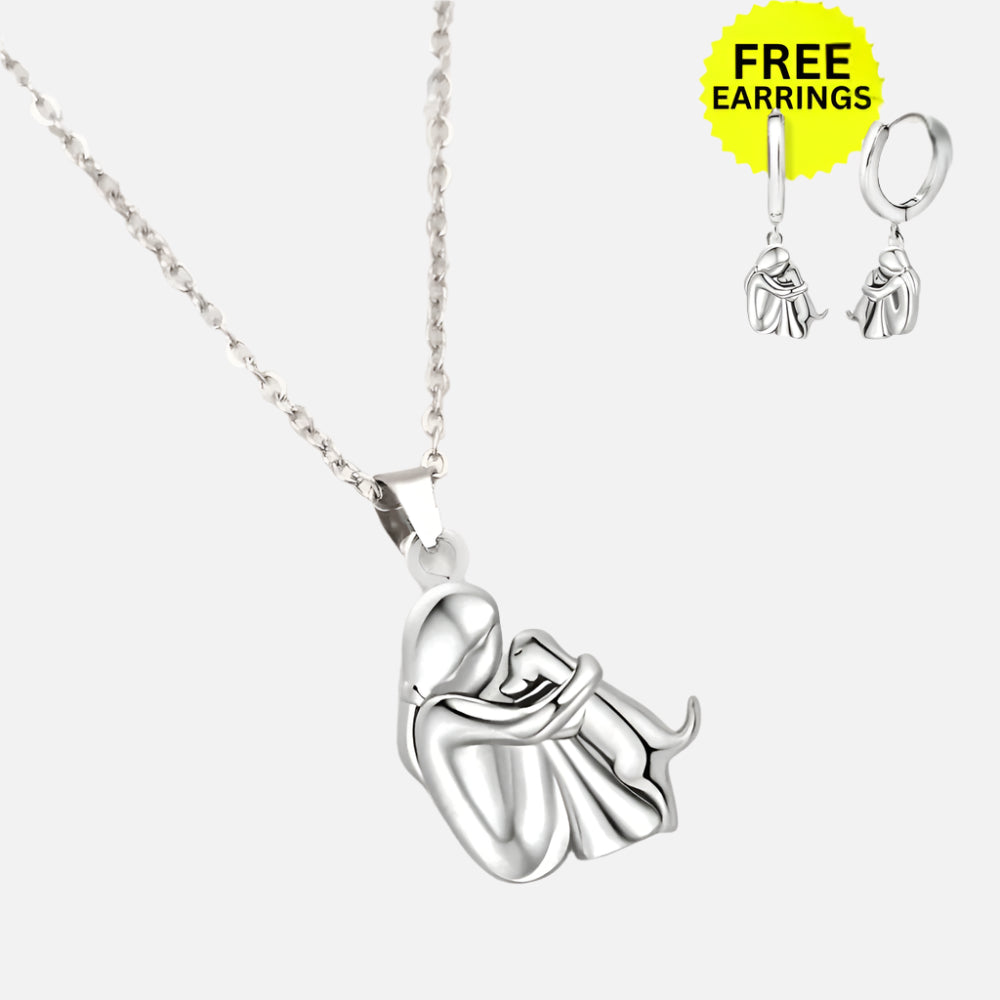 Veda Bremen necklace with hug pendant and free matching earrings, stylish jewelry set displayed on a neutral background.