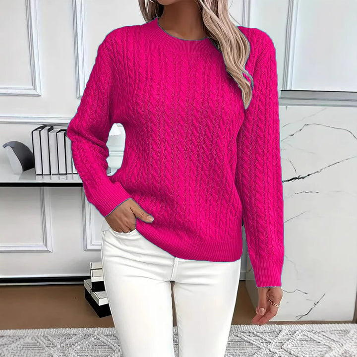 Pink Rosa knitted sweater from Lurolondon.co.uk, featuring a cozy, chunky knit design and a relaxed fit.