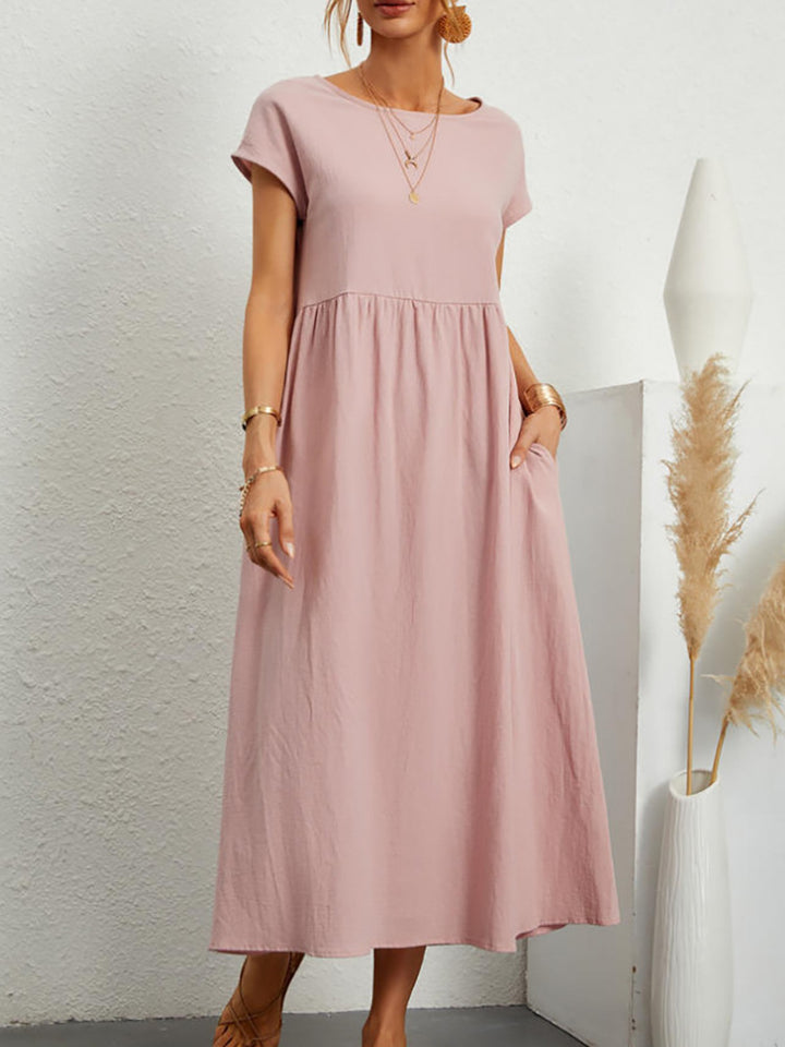 Pink Veda Bremen Gabrielle Midikleid with flowing silhouette, featuring a soft, elegant fabric and a relaxed, stylish fit.