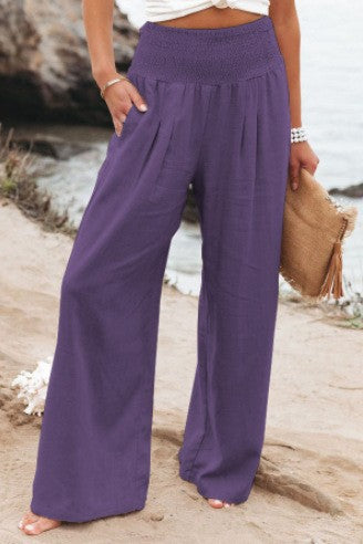 Purple Romy Weithose by Veda Bremen, stylish high-waisted trousers with a tapered fit and smooth fabric.