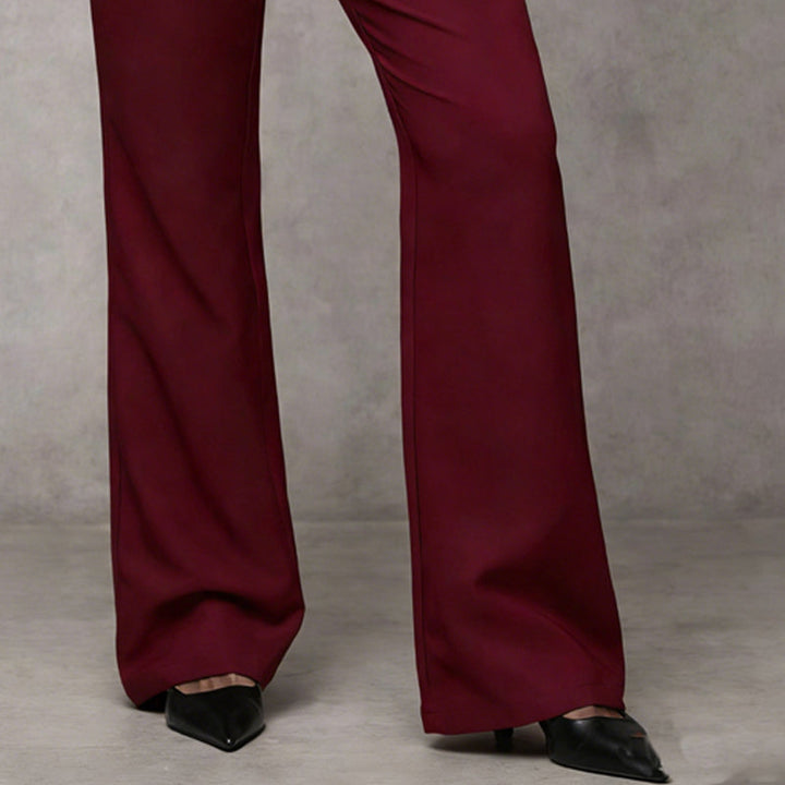 Veda Bremen Elowra tailored wide-leg trouser in clothing, featuring a refined fit and classic design, shown on a hanger.