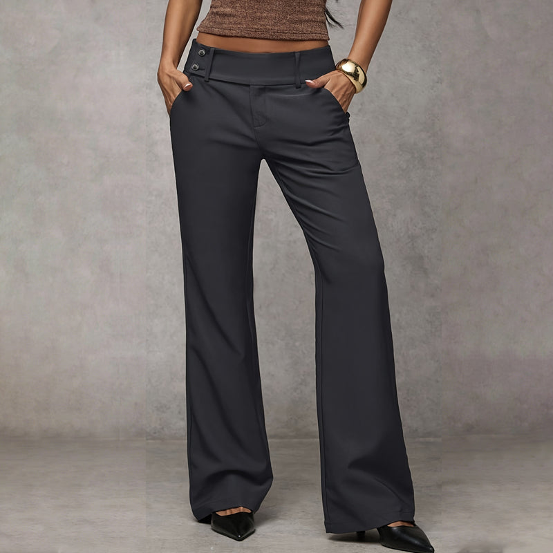 Veda Bremen Elowra tailored wide-leg suit trousers in stylish fabric, displayed on a hanger with a plain background.