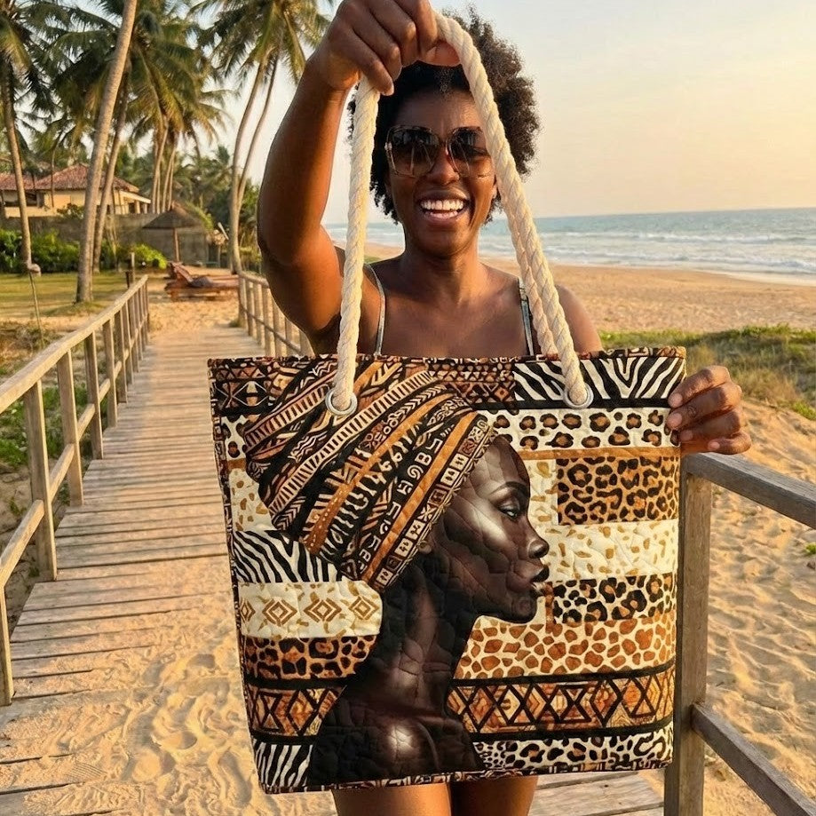 Veda Bremen Melanin Queen quilted beach bag with black handles and a stylish design, perfect for carrying beach essentials.