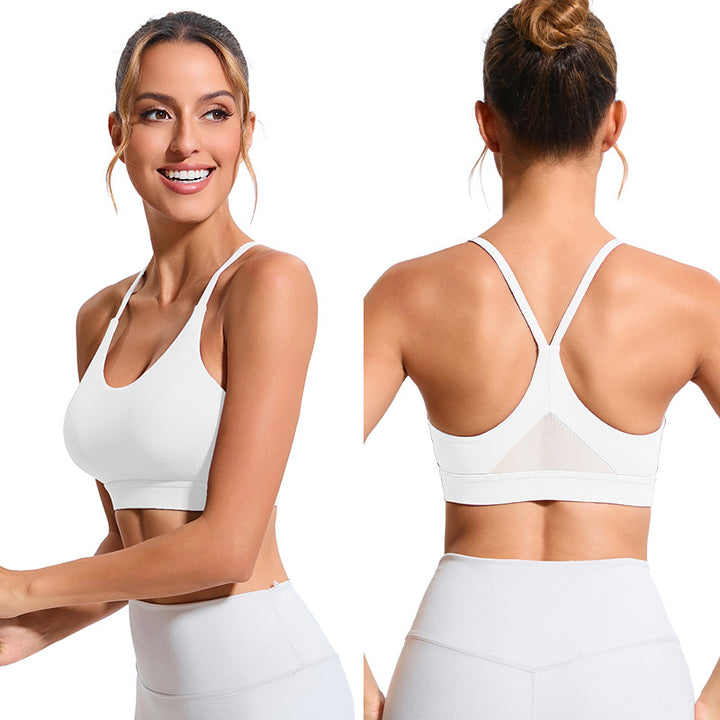 White supportive form bra by Veda Bremen, with smooth cups and adjustable straps for comfortable everyday wear.