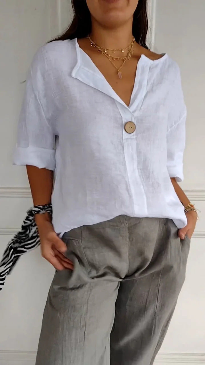 White Valentina blouse by Veda Bremen, featuring a flowy fabric and elegant design, displayed on a mannequin.