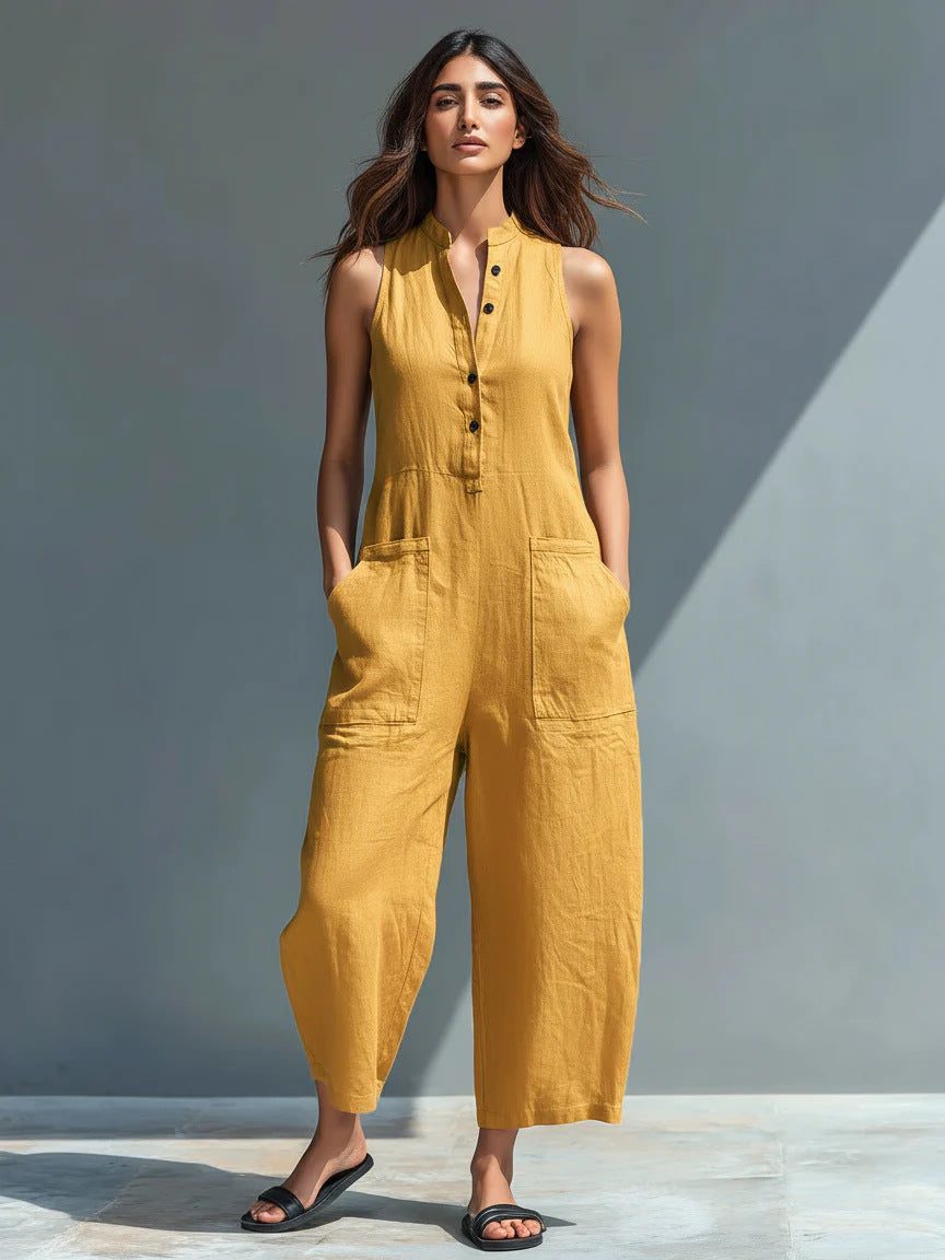Yellow Veda Bremen Lotte sleeveless minimalist jumpsuit, showcasing a sleek, modern design with a fitted silhouette.